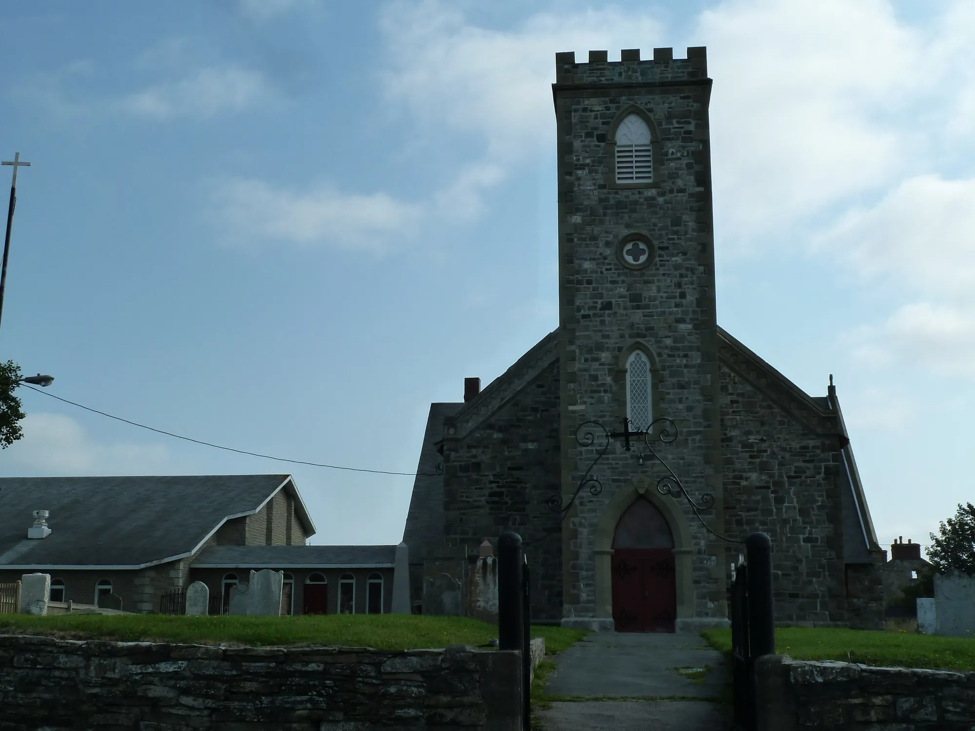St. Paul's stone Anglican church, blue sky.