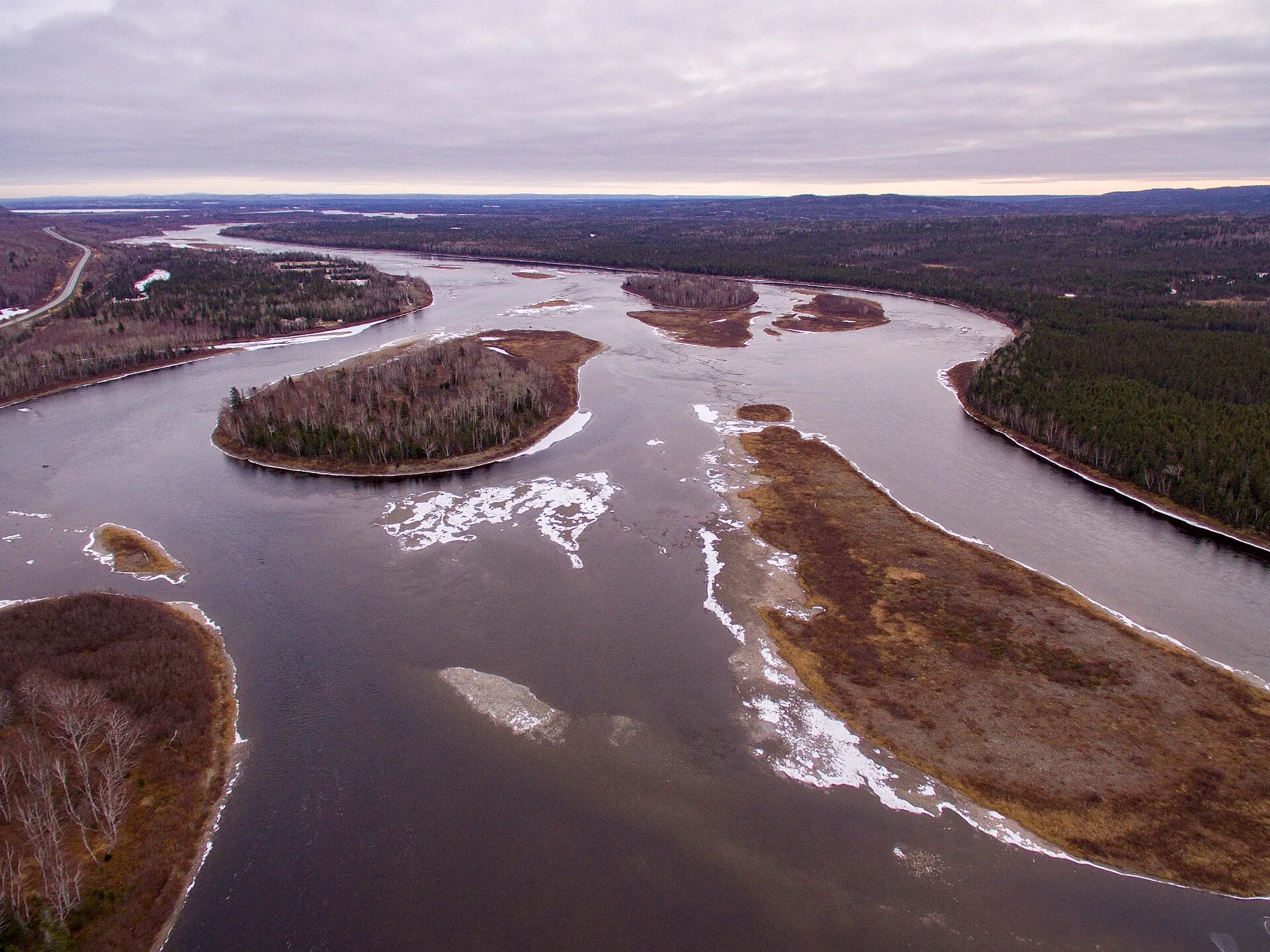 The braided channels and wooded islands of the Exploits River from the air, near Grand Falls-Windsor — the biggest river on the island.