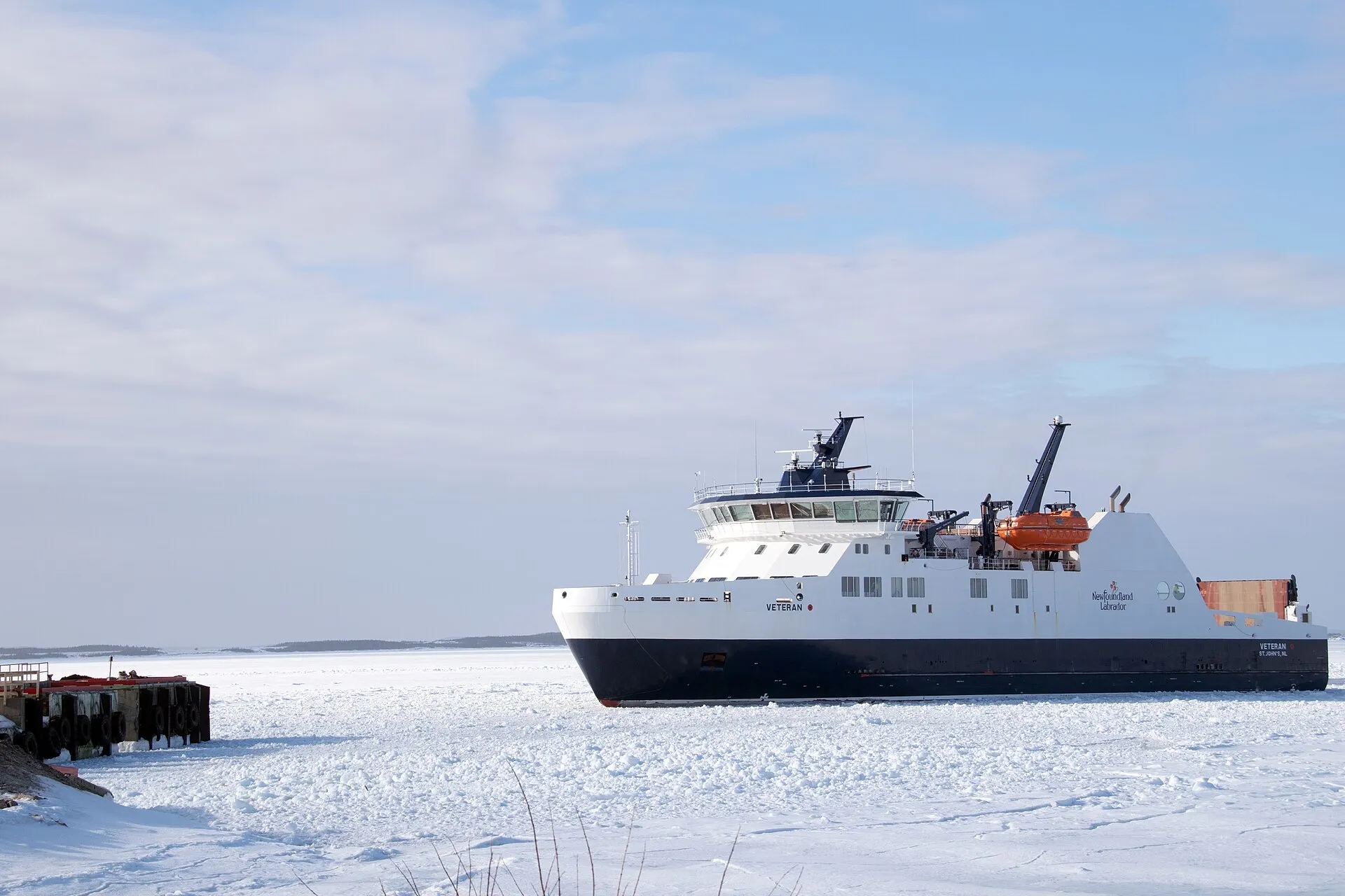 MV Veteran holding at the wharf in heavy sea ice — the kind of day this guide exists for.